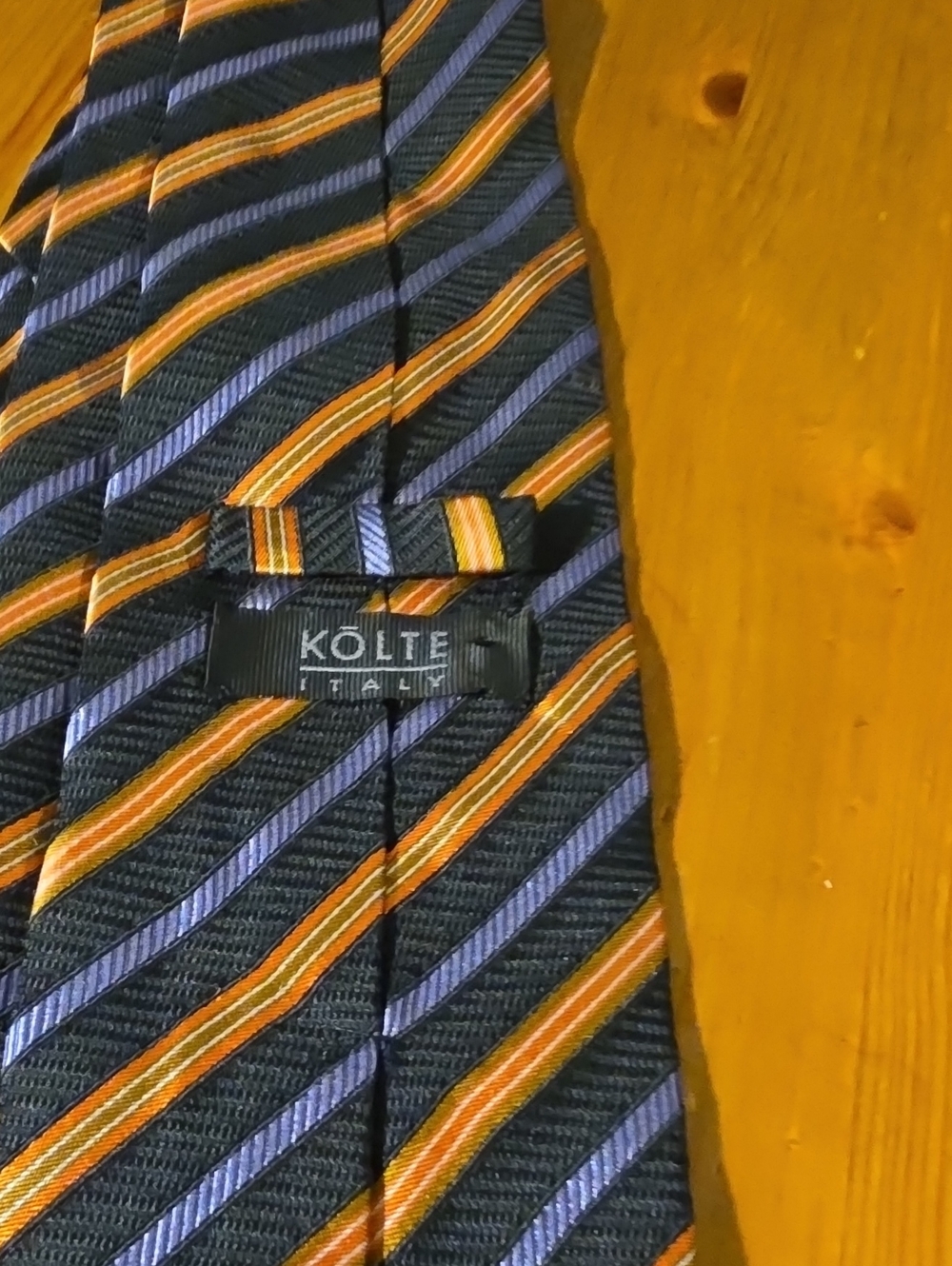Kolte Italy Men's Black Stripe Silk Tie with Orange and Purple Accents